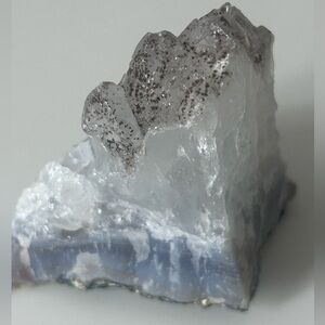 Speckled quartz cluster on top of agate with mini druzy cave